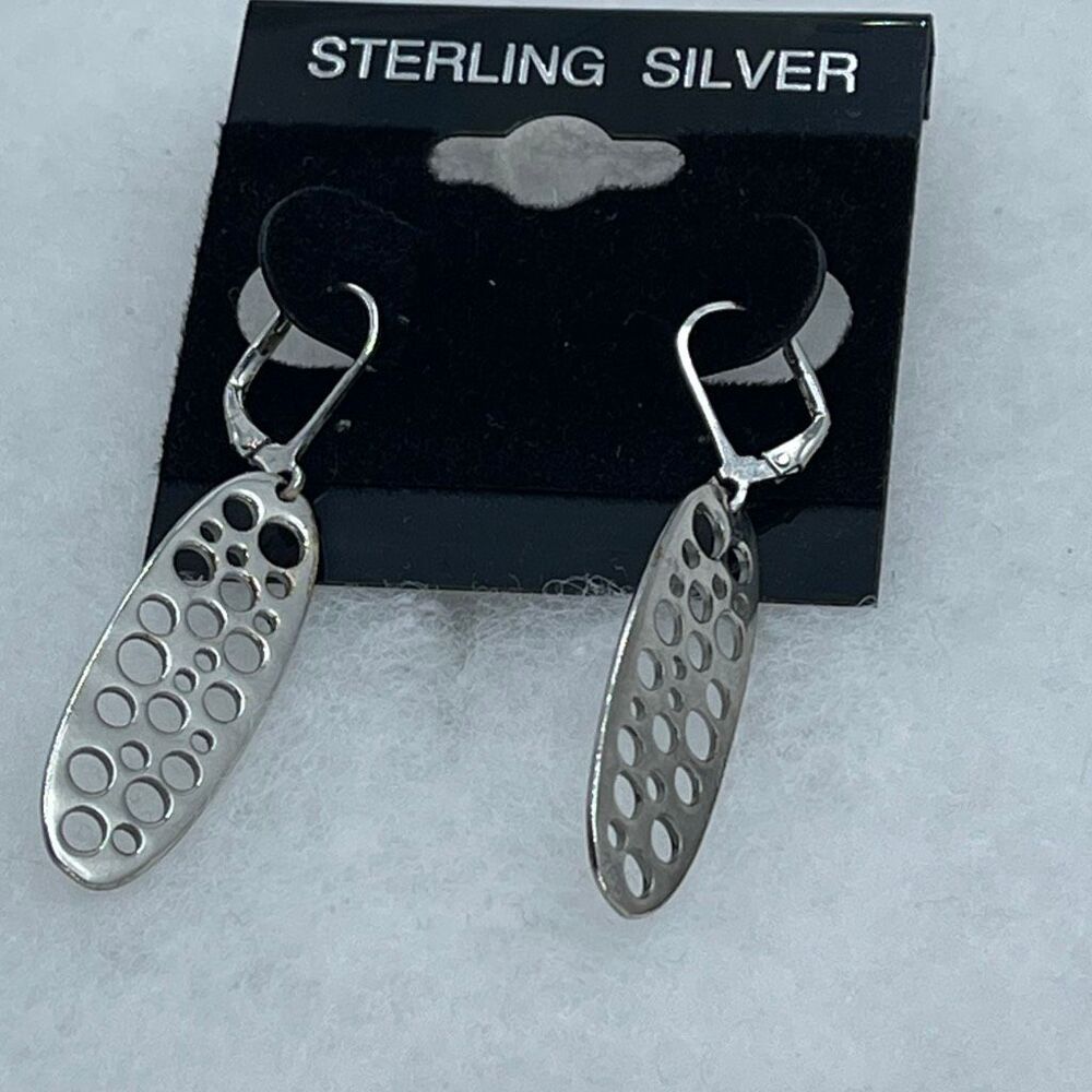 Sterling silver dangle earrings oval polka dot design.